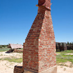 Chimney left standing at Zanci homestead. Photograph © Ian Brown